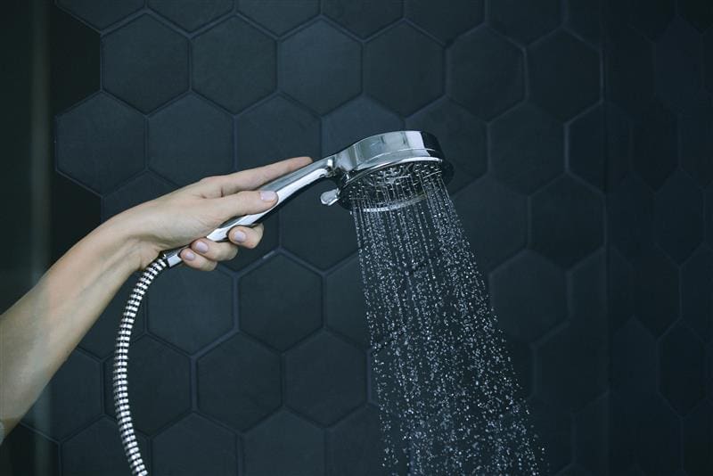 A showerhead with water running
